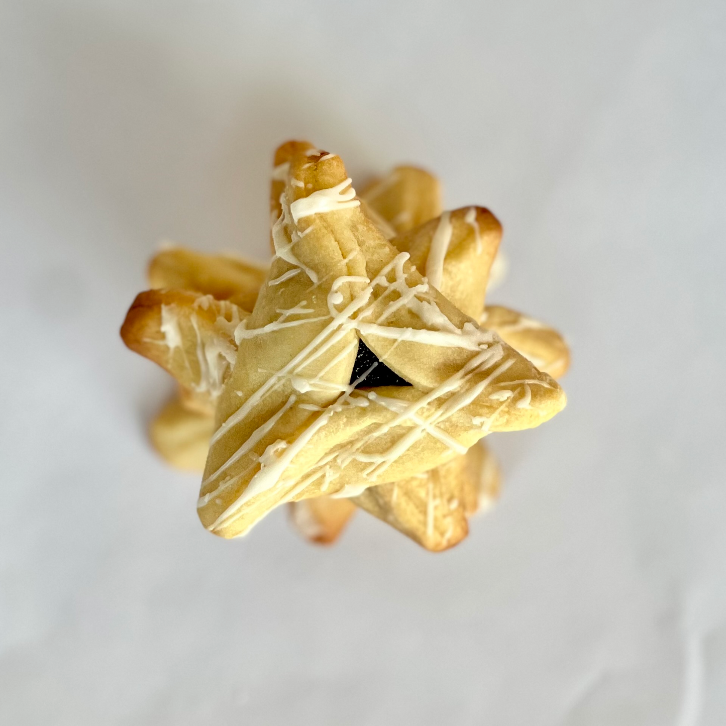 Guava Hamantaschen with White Chocolate Drizzle